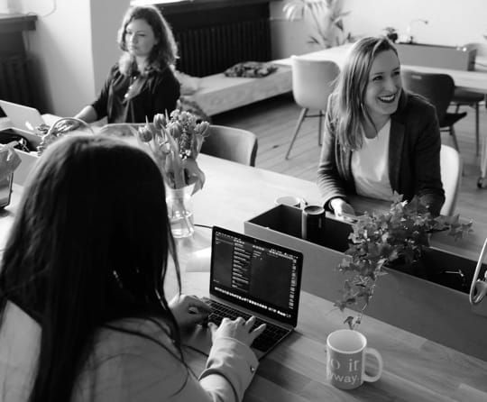 corporative desk with happy people working